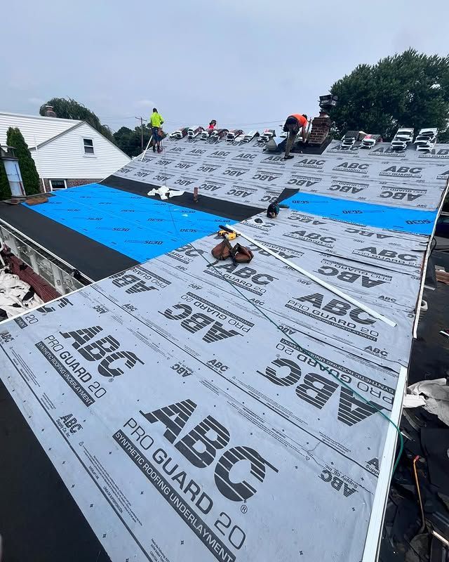 A roof is being covered with abc pro guard 20.