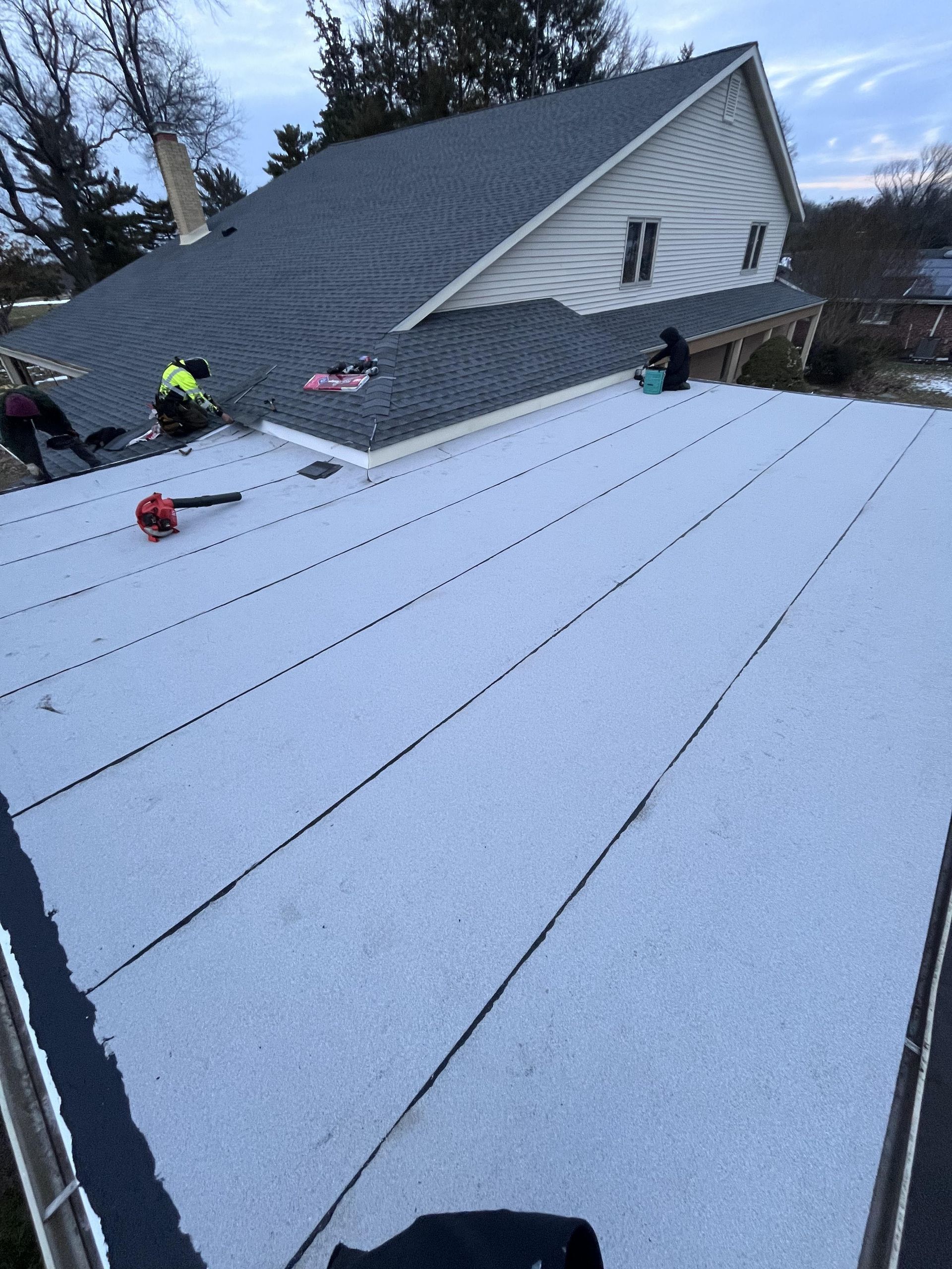 A house with a roof that is being worked on