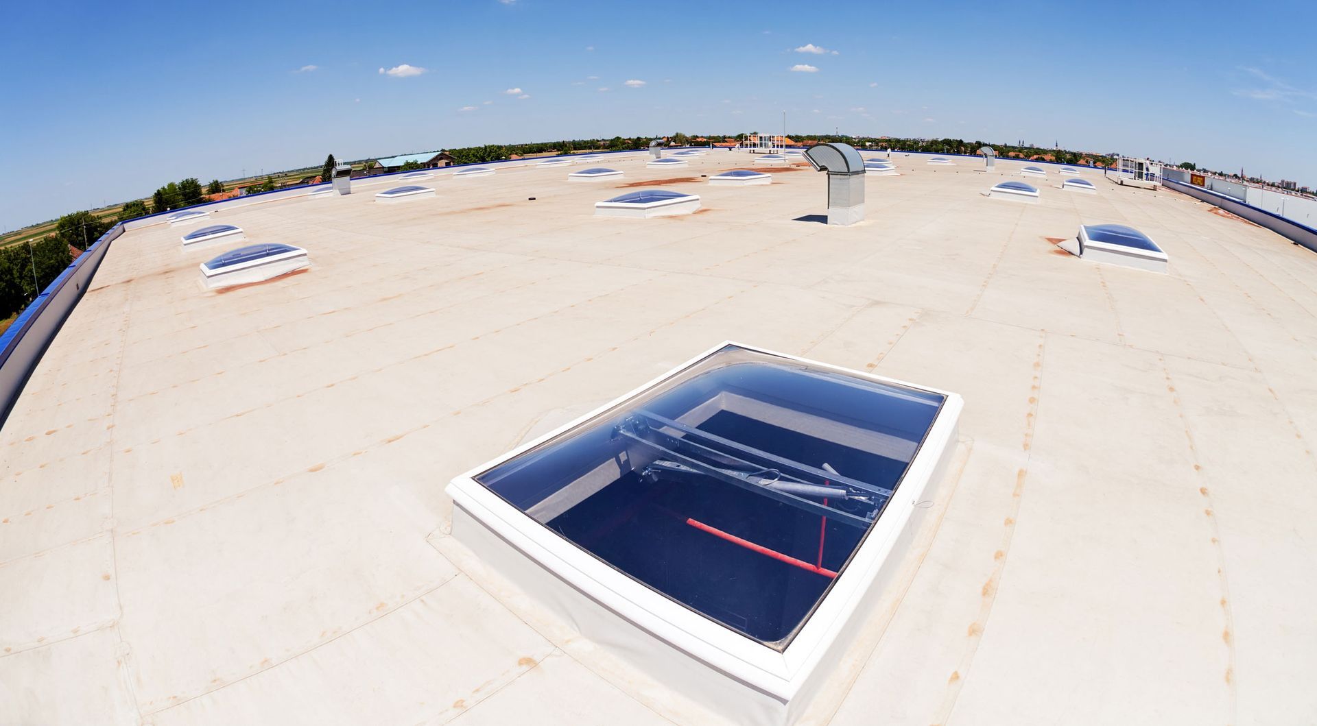 The roof of a building with a skylight on it
