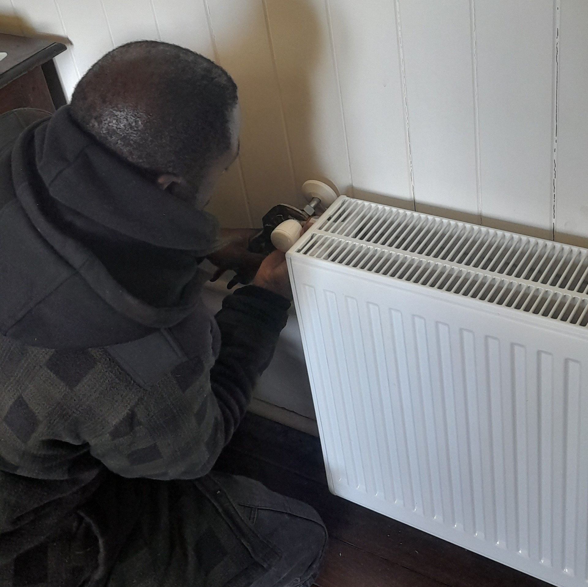 Lou, one of our plumbers, replacing / installing hydronic radiators and servicing a boiler system.