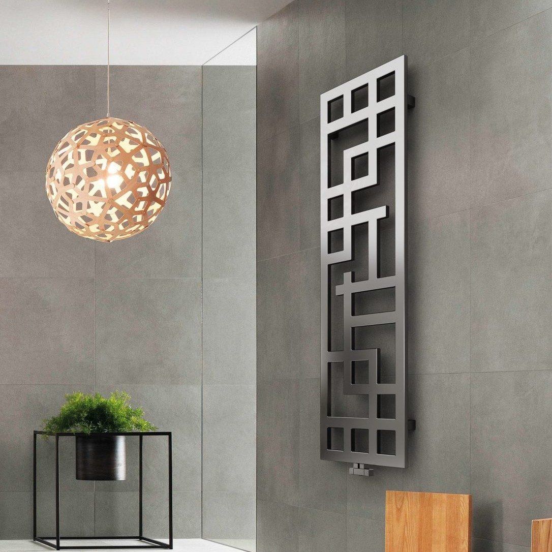 A black radiator panel that appears more like a contemporary art installation.