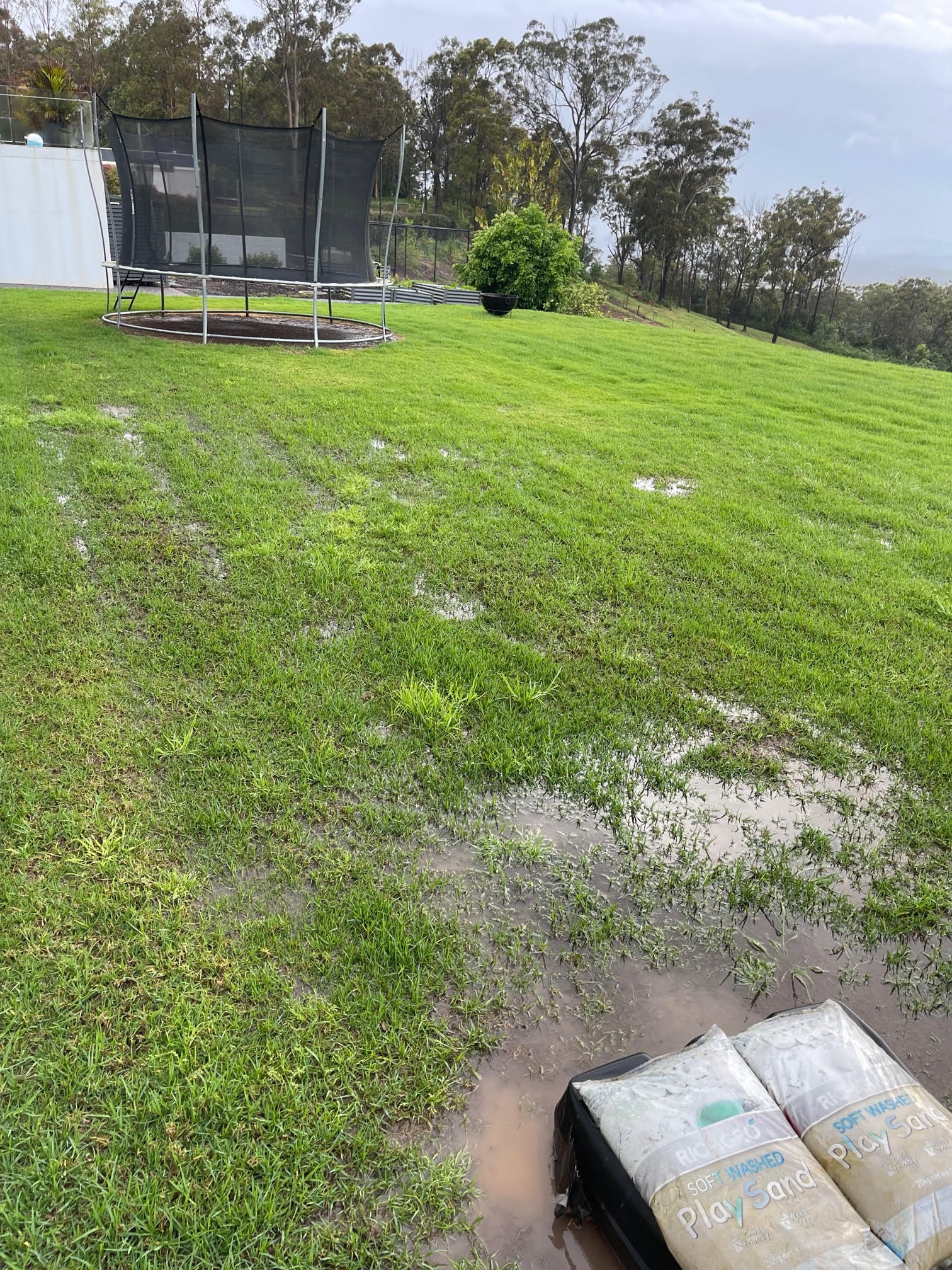 A flooded yard we recently completed stormwater rectification work on