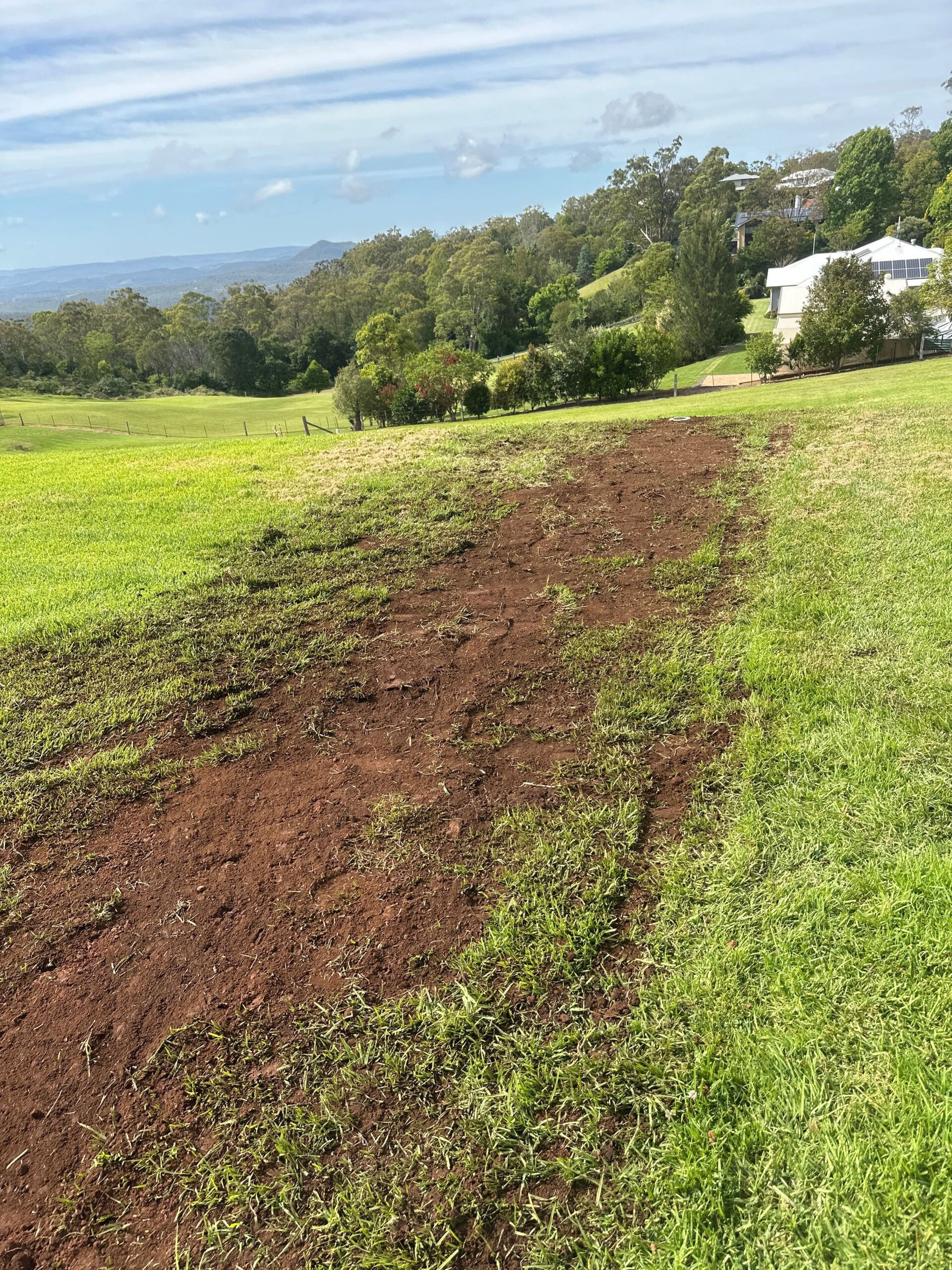 Stormwater drainage installation - all complete - the grass will grow back in no time!