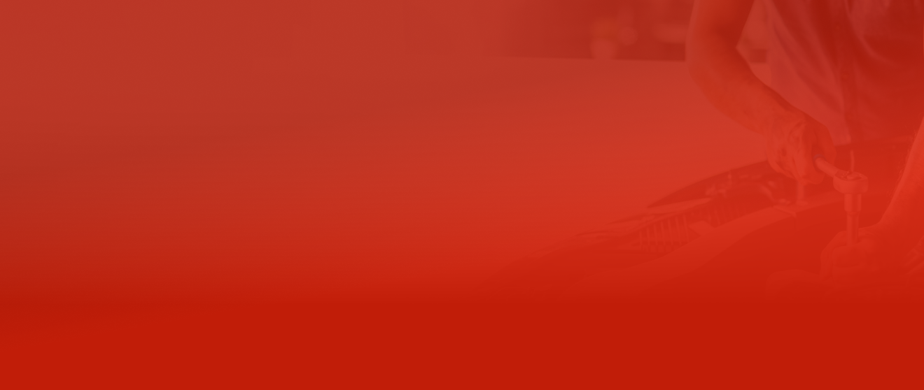 A person's silhouette with a red gradient background. | Lambert's Auto Repair