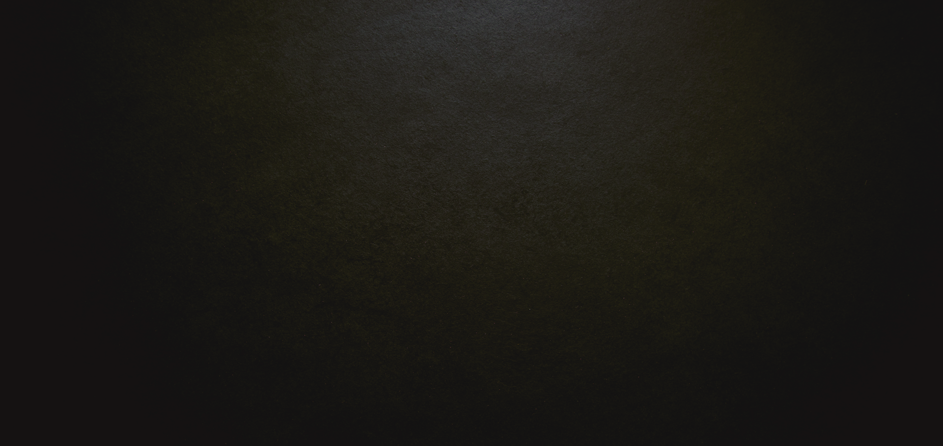 Dark, textured background with subtle highlights. | Lambert's Auto Repair