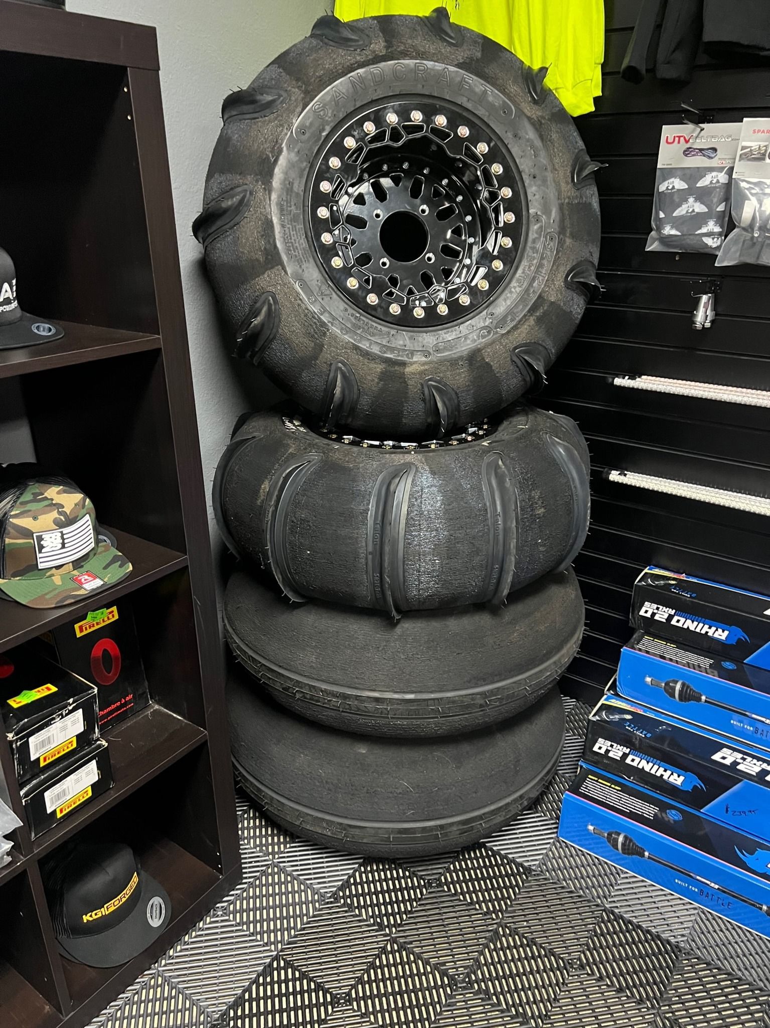 A stack of tires sitting on top of each other in a room.