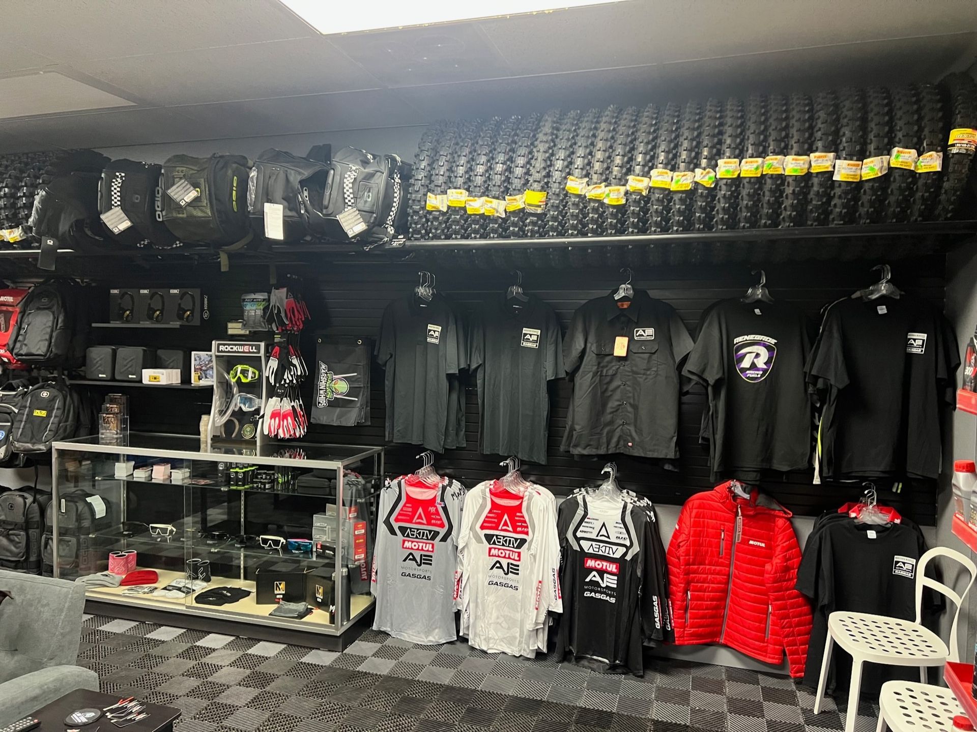 A store filled with lots of shirts and jackets.