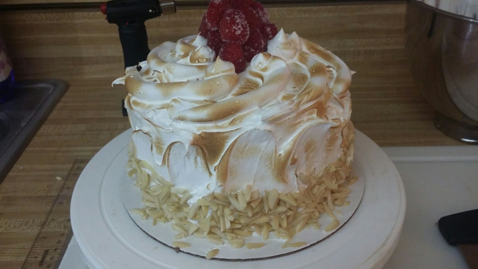 Toasted Swiss Meringue cake with slivered almonds
