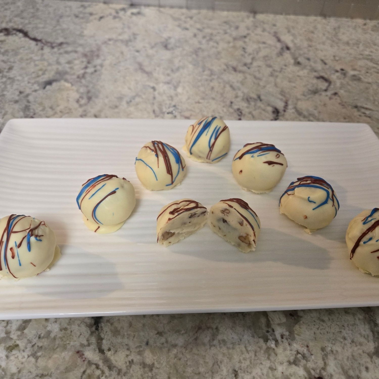 White chocolate covered coconut milk & white chocolate ganache with pecan bonbons