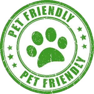 A green stamp that says pet friendly with a paw print in the center