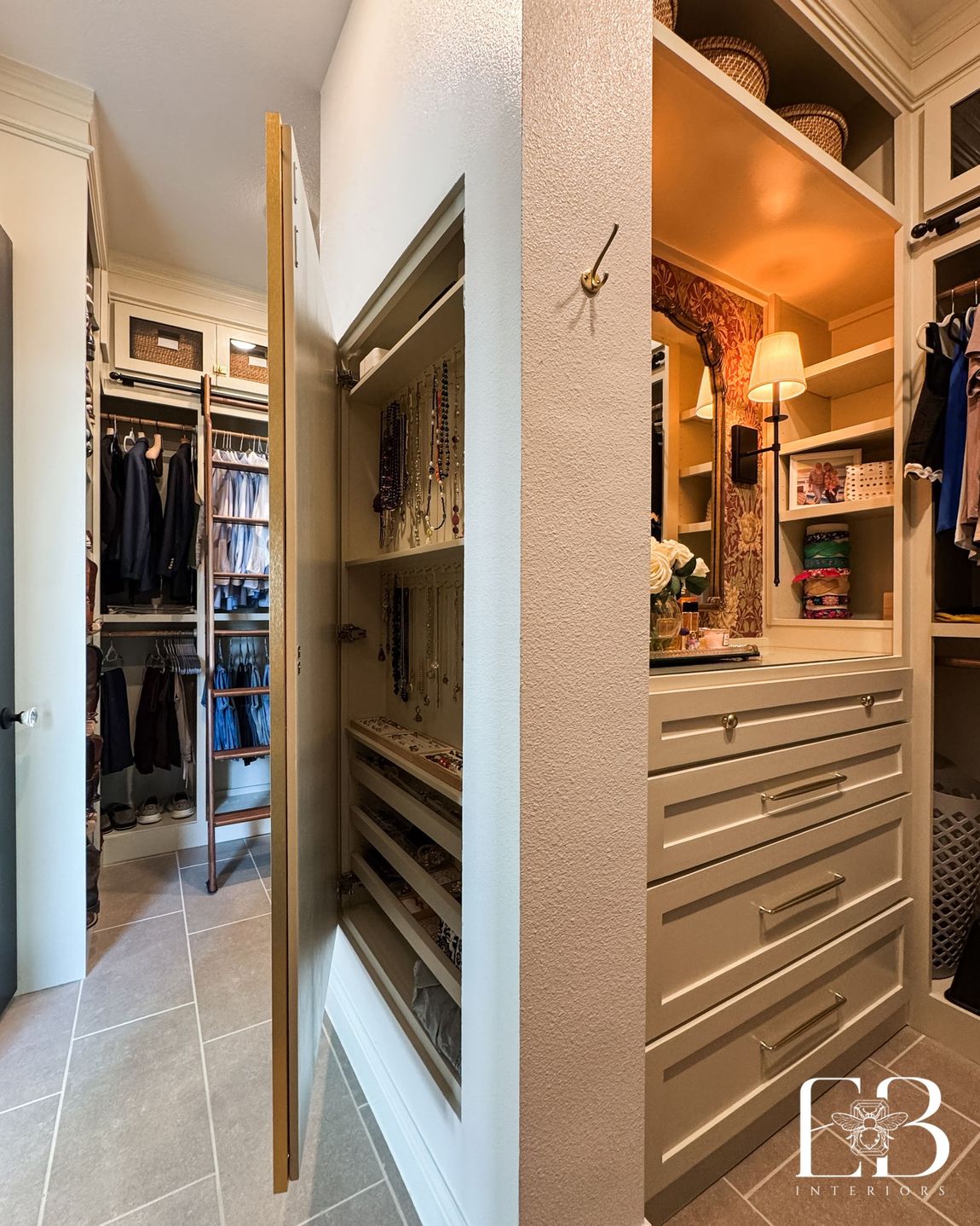 Hidden jewelry cabinet in custom closet millwork with lined drawers and necklace storage by Emerald Bee Interiors.