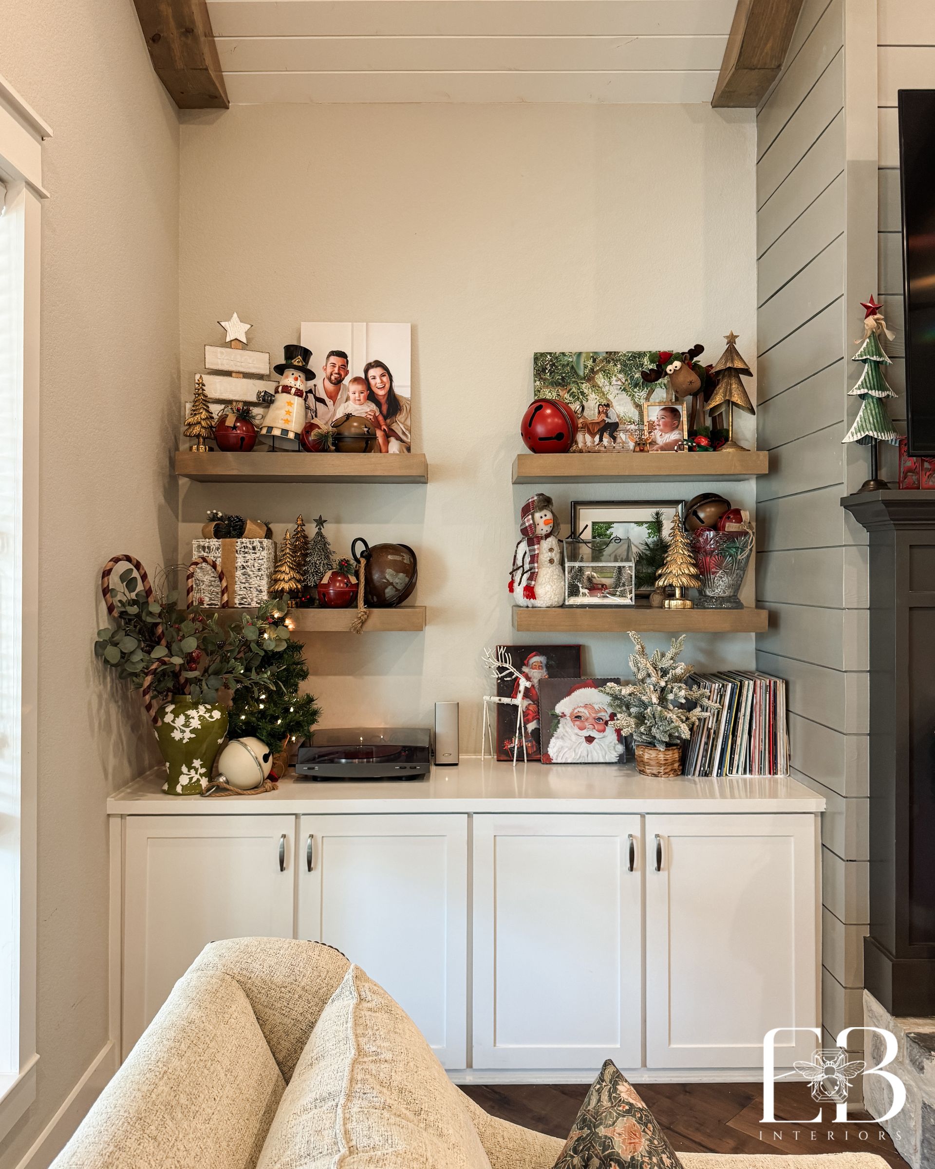 Devotion Row vignette with floral cabinet, green paneling, and Mission-style furniture by Emerald Bee Interiors.