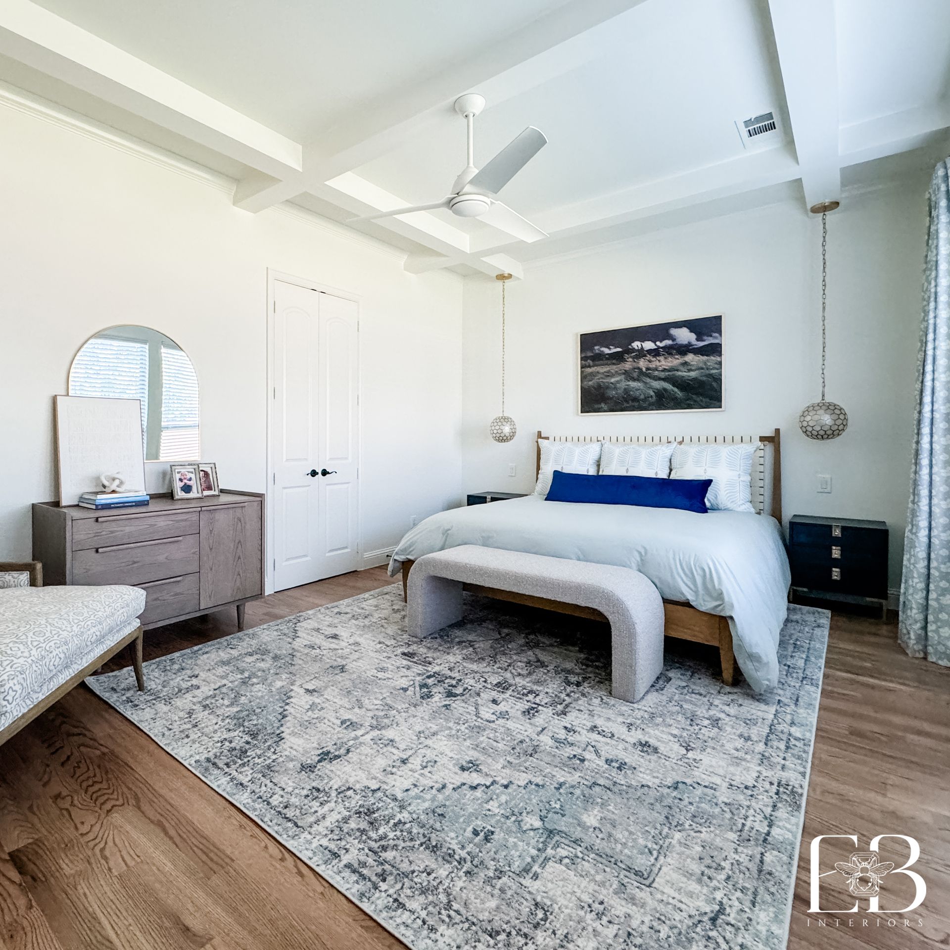 Primary suite and whole-home renovation featuring custom beams, organic textures, and soft harmony.