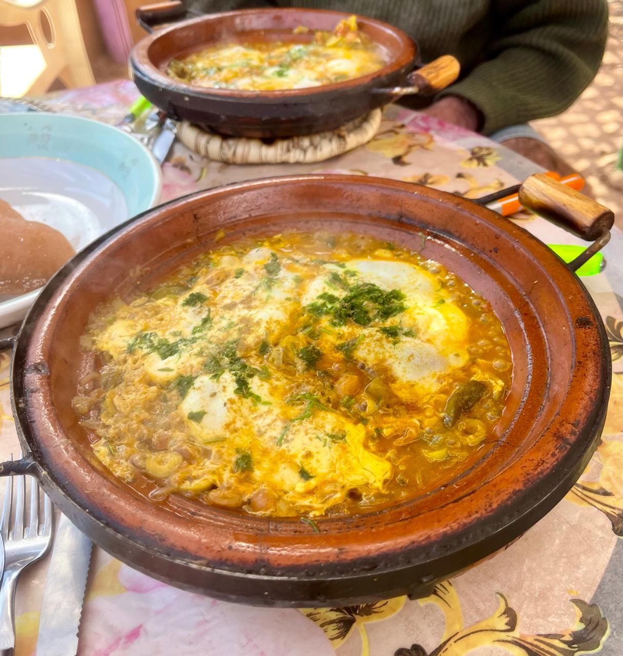 A close up of a bowl of food on a table
