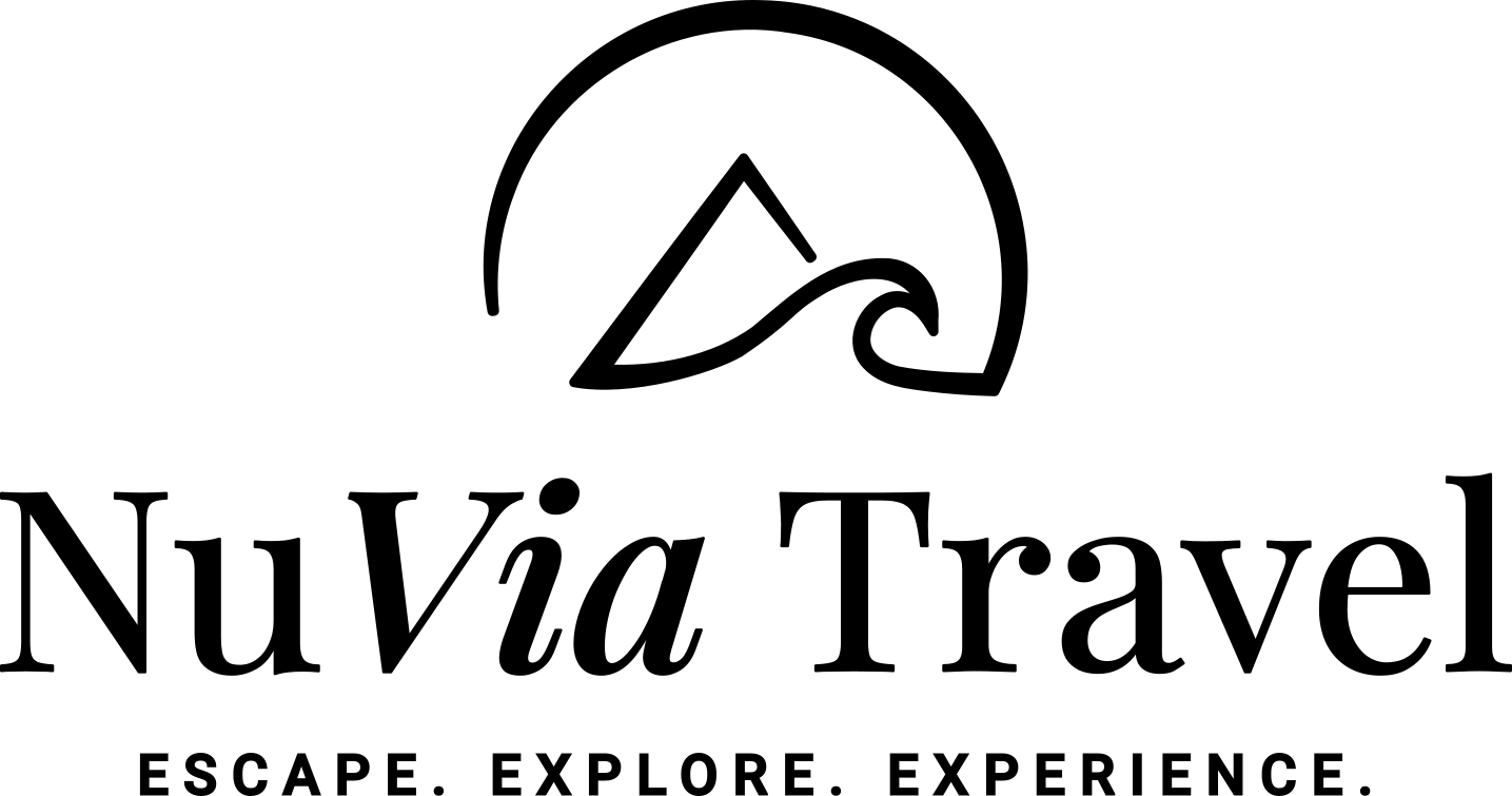NuVia Travel logo with stylized mountain and wave above the text “Escape. Explore. Experience.”