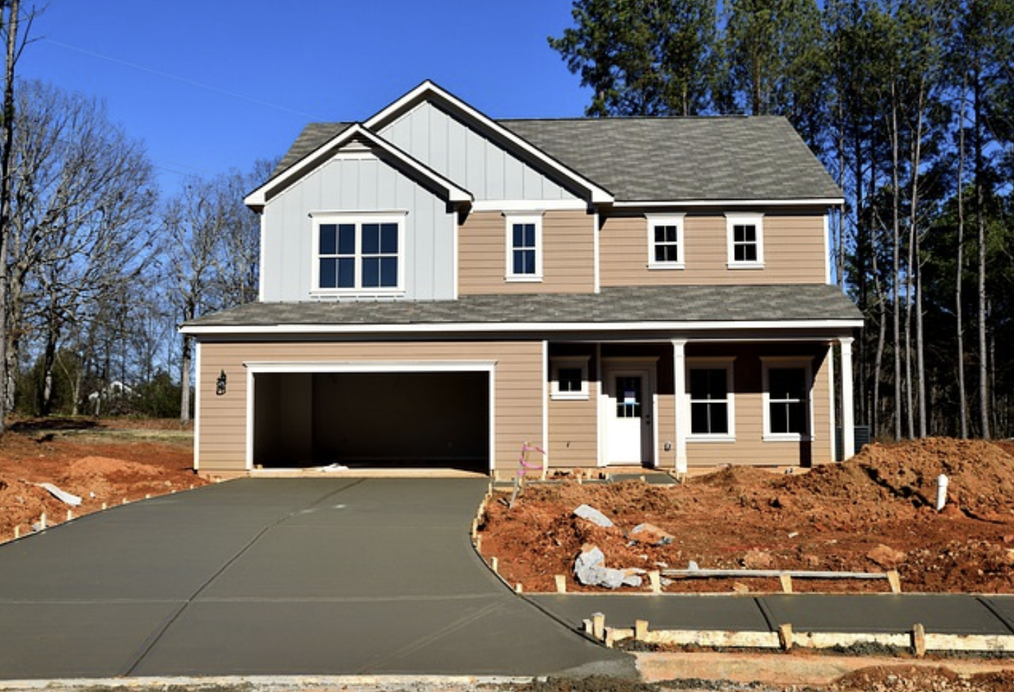 Concrete driveway completed for new house.