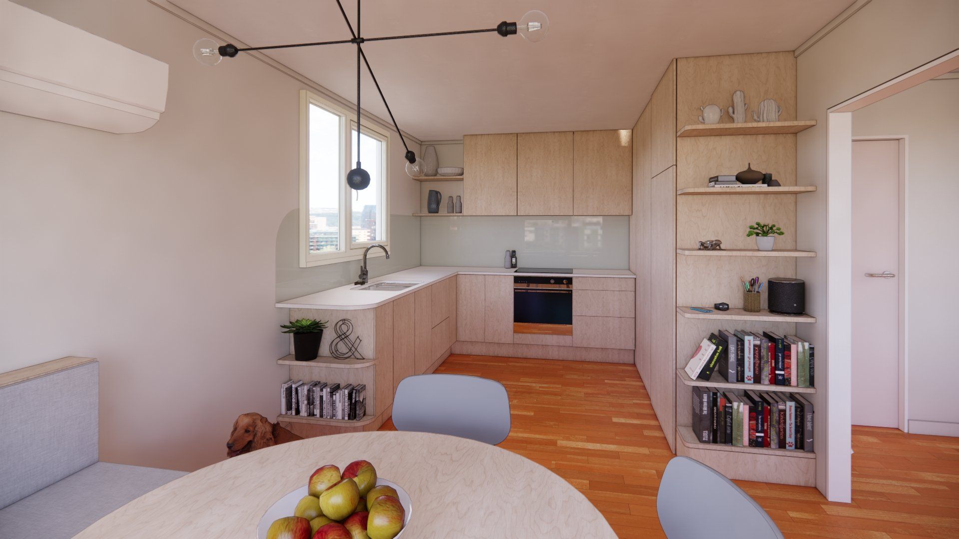 There is a bowl of apples on the table in the kitchen.