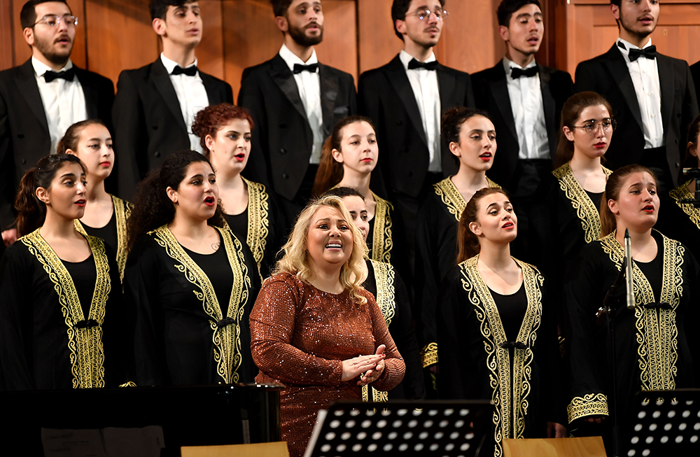 Maria Mattar at the Giving Voice to Music concert at AUB Hall, with the Al Fayha National choir 