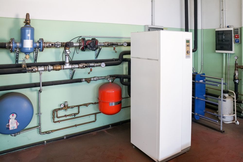 White Mechanical Unit With Pipes — Darren Gray Cad Services In Upper Corindi, NSW