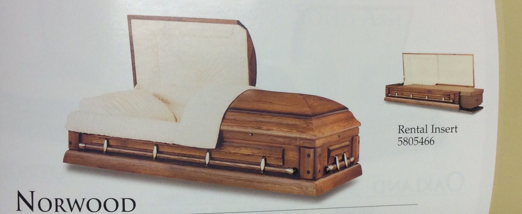 A picture of a coffin that says norwood on it