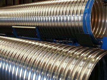 Large corrugated metal culverts manufactured in a factory