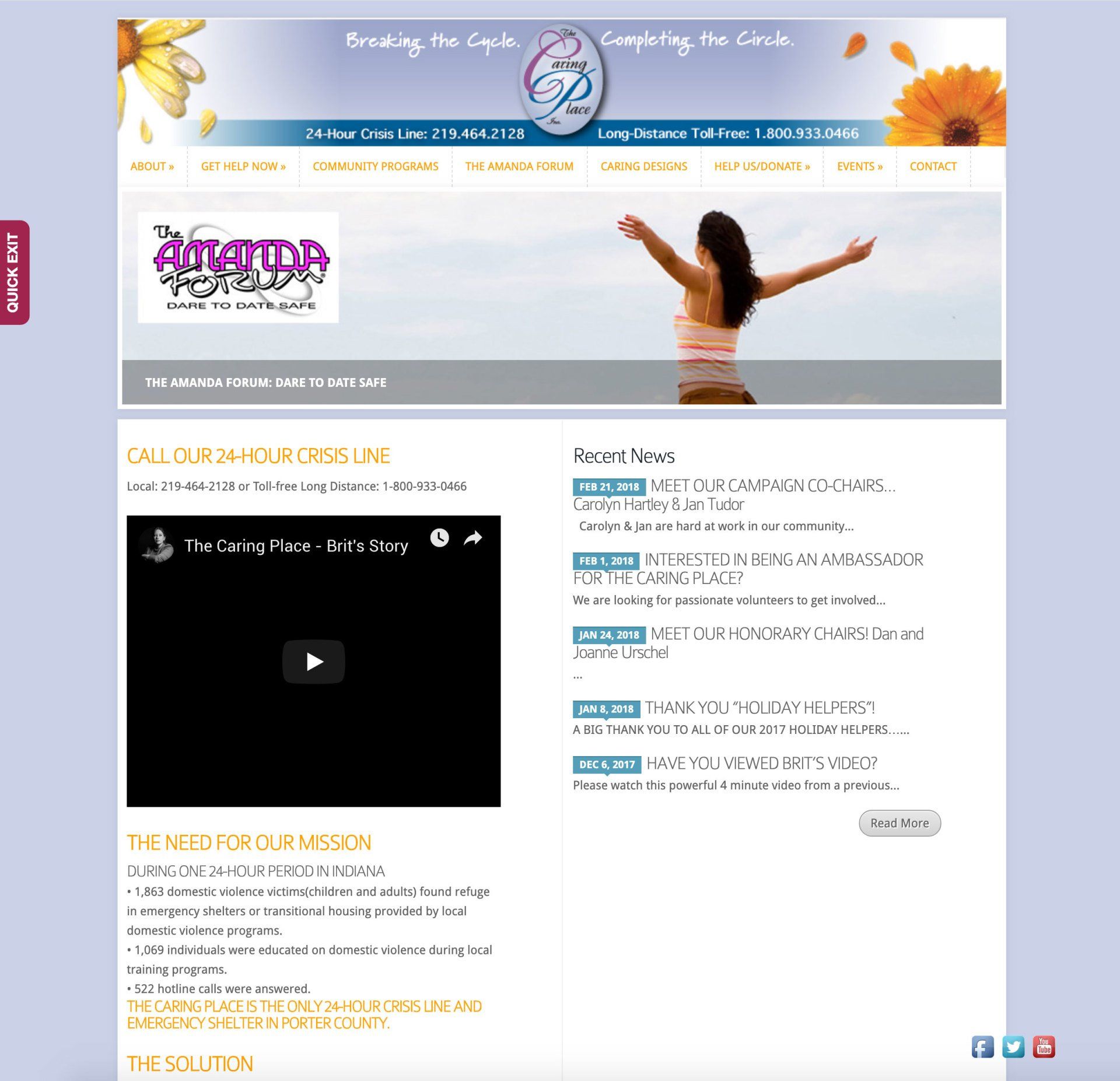 A woman is standing with her arms outstretched on a website