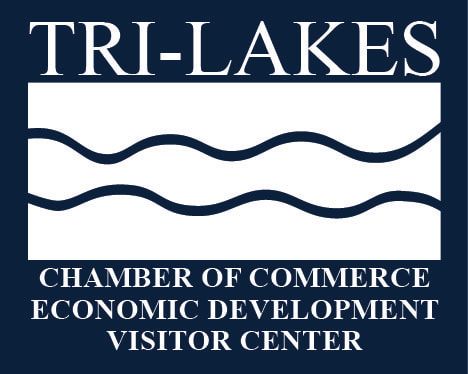 Tri-Lakes Chamber of Commerce logo: white text and wavy lines on a blue background.