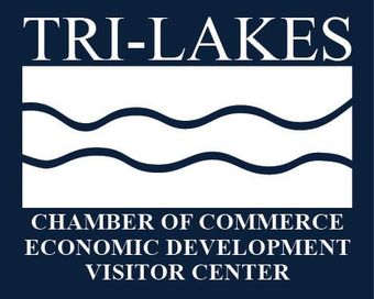 Tri-Lakes Chamber of Commerce logo: white text and wavy lines on a blue background.