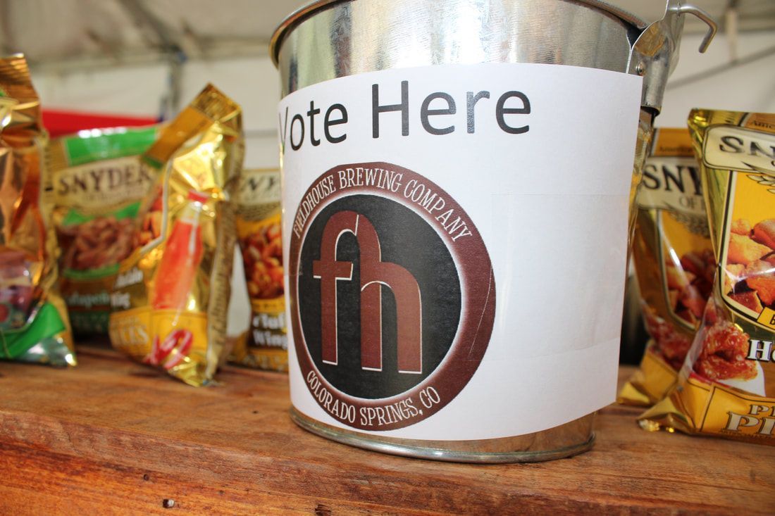 Metal bucket labeled 