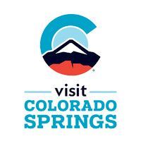Visit Colorado Springs logo featuring a blue