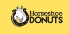 Logo for Horseshoe Donuts: horse head in a horseshoe with 