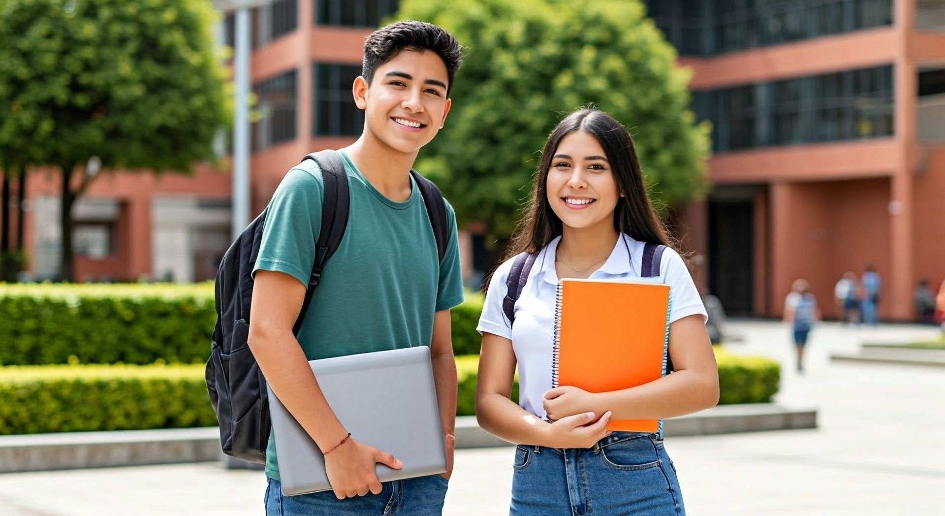 A boy and a girl are standing next to each other on a college campus.