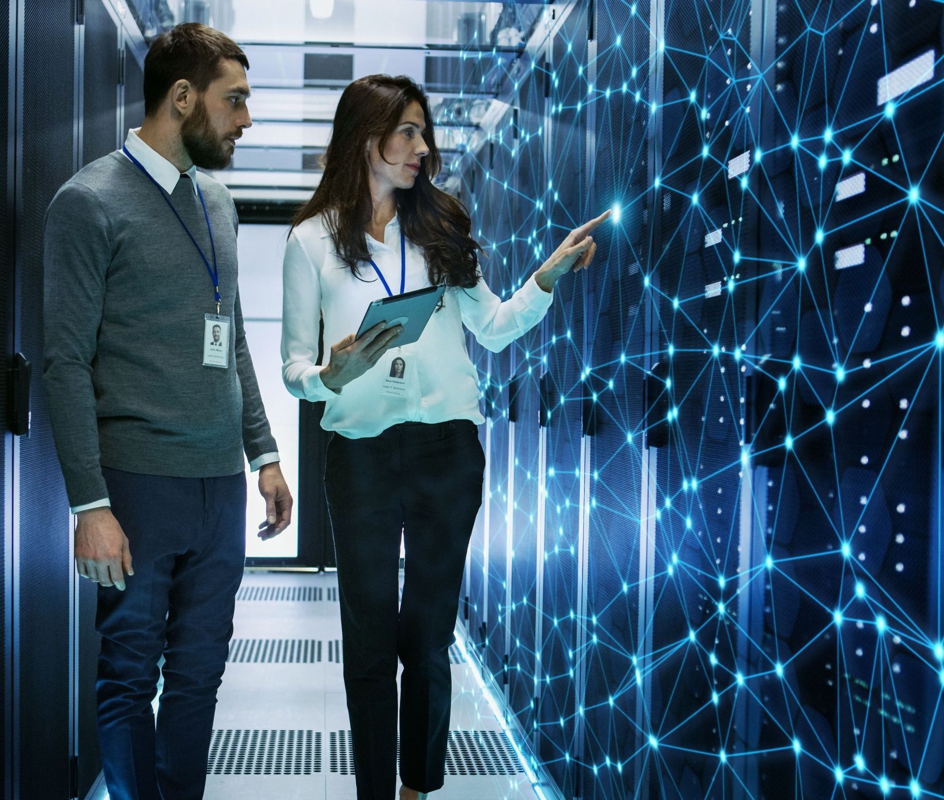 A woman showing cloud computing solutions to a potential client.