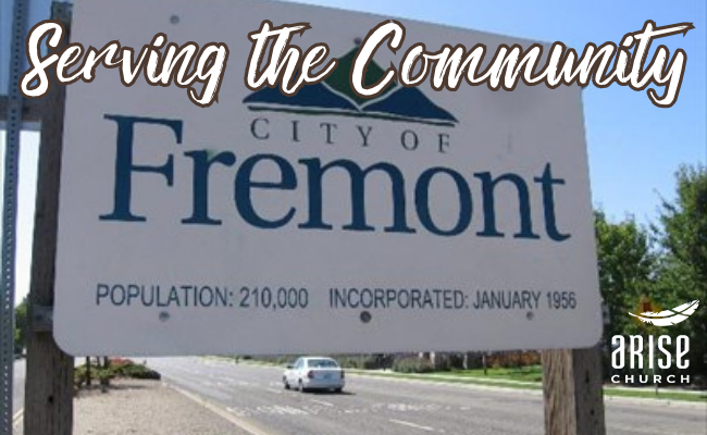 A sign that says serving the community city of fremont