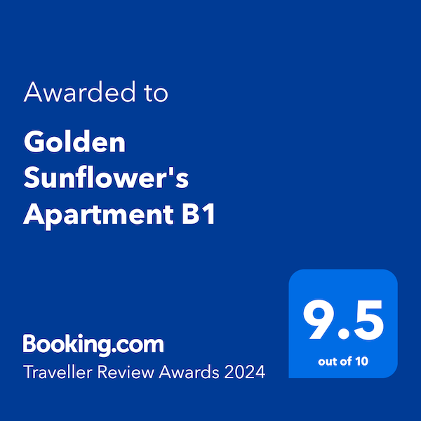 A booking.com traveler review award for golden sunflower 's apartment b1
