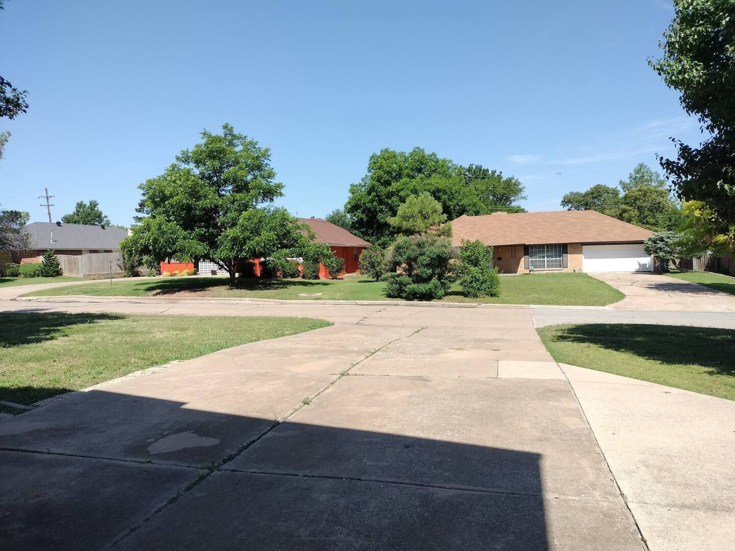 A residential area with a lot of houses and trees