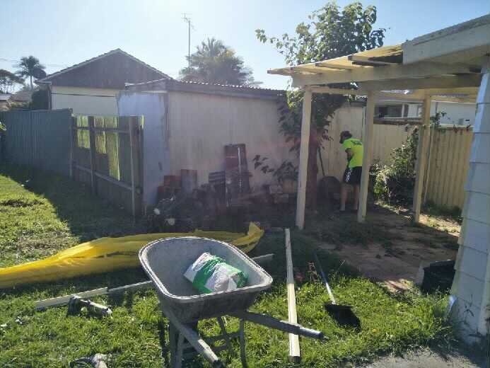 Man Repairing Backyard - Fencing In Albion Park Rail, NSW