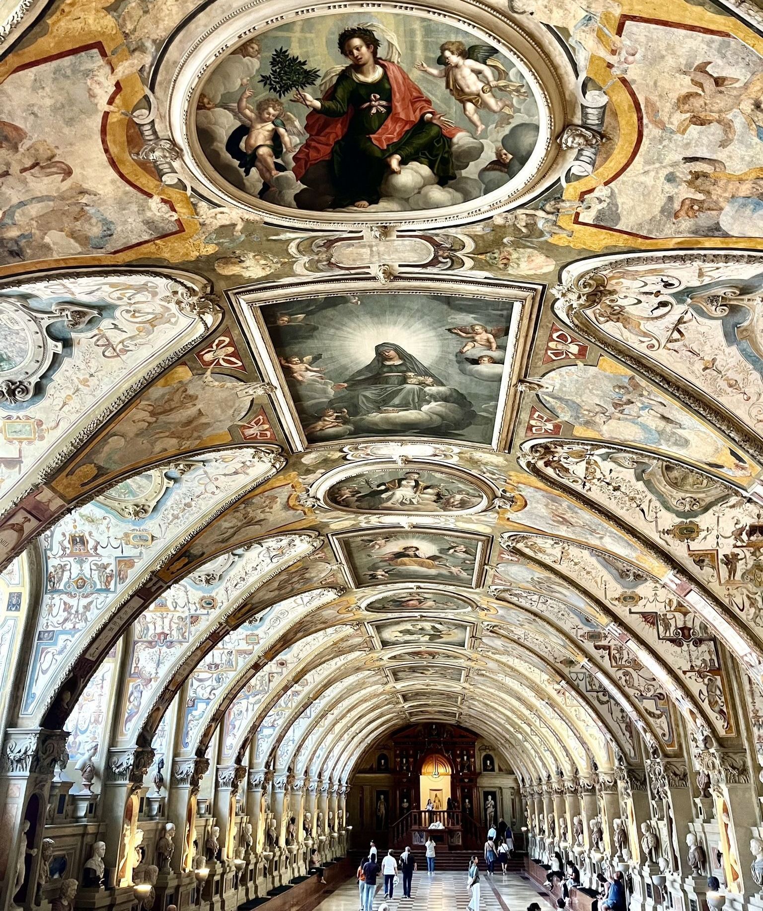 An airport at night with a control tower in the foreground