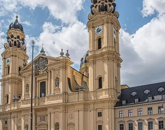 A large building with a clock tower on top of it.