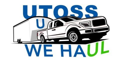 Logo featuring a white truck towing a trailer. 