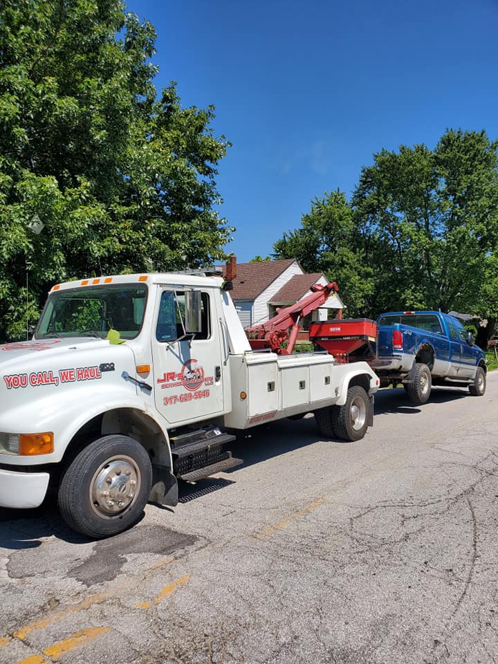 Tow Truck Towing a White Van ─ Indianapolis, IN ─ JR’s Services & Recovery