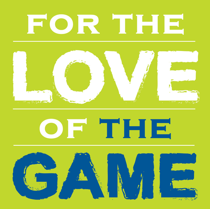 Basketball about to go through a hoop.