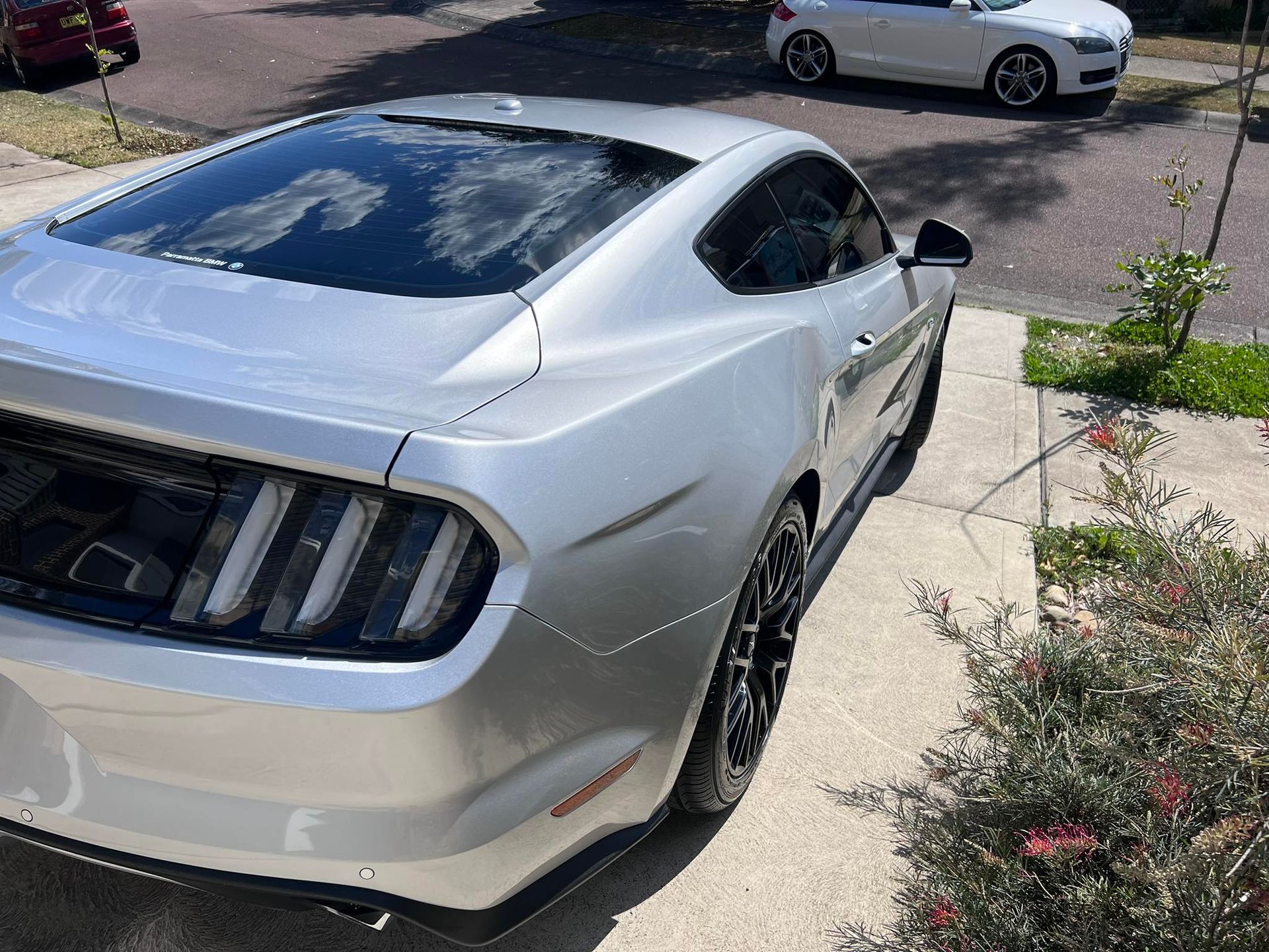 Silver Sports Car Parked in a Driveway, Viewed From the Rear-left Side — Car Detailing Mobile Cleaning Co In Lake Cathie, NSW