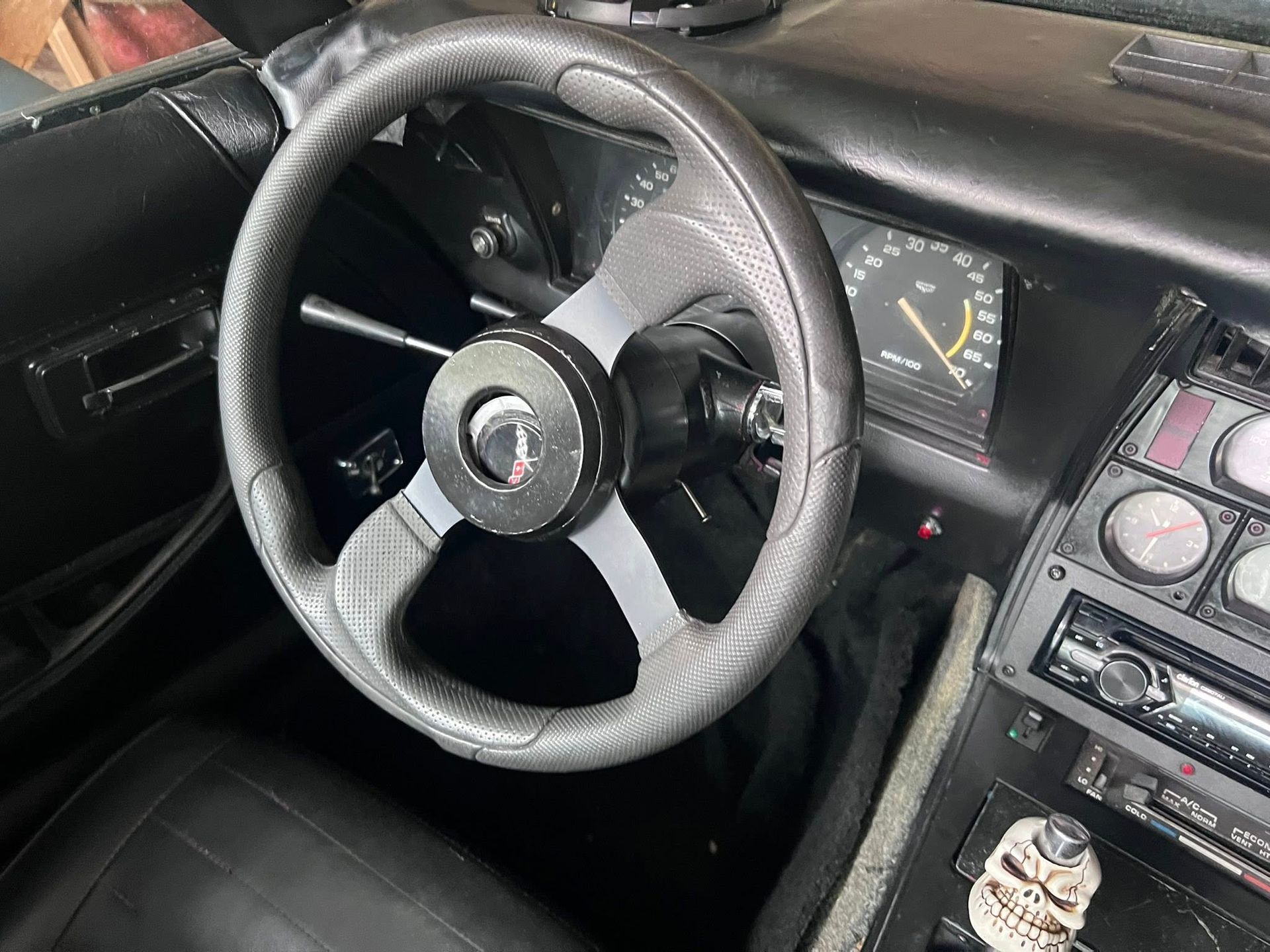 Vintage Car Interior With Black Steering Wheel — Car Detailing Mobile Cleaning Co In Wauchope, NSW