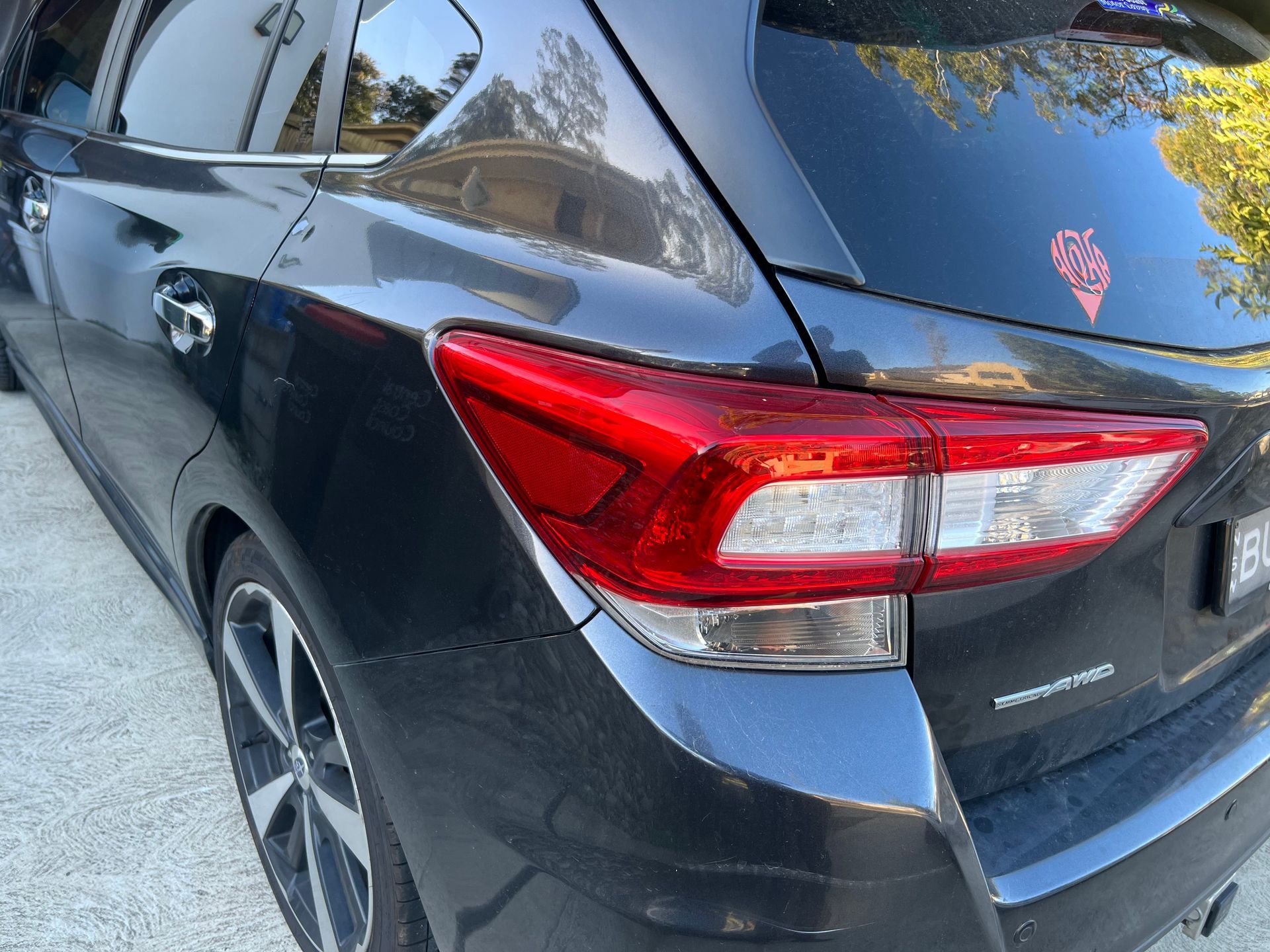 Rear Side of a Black SUV, Showing the Red Taillight — Car Detailing Mobile Cleaning Co In Wauchope, NSW