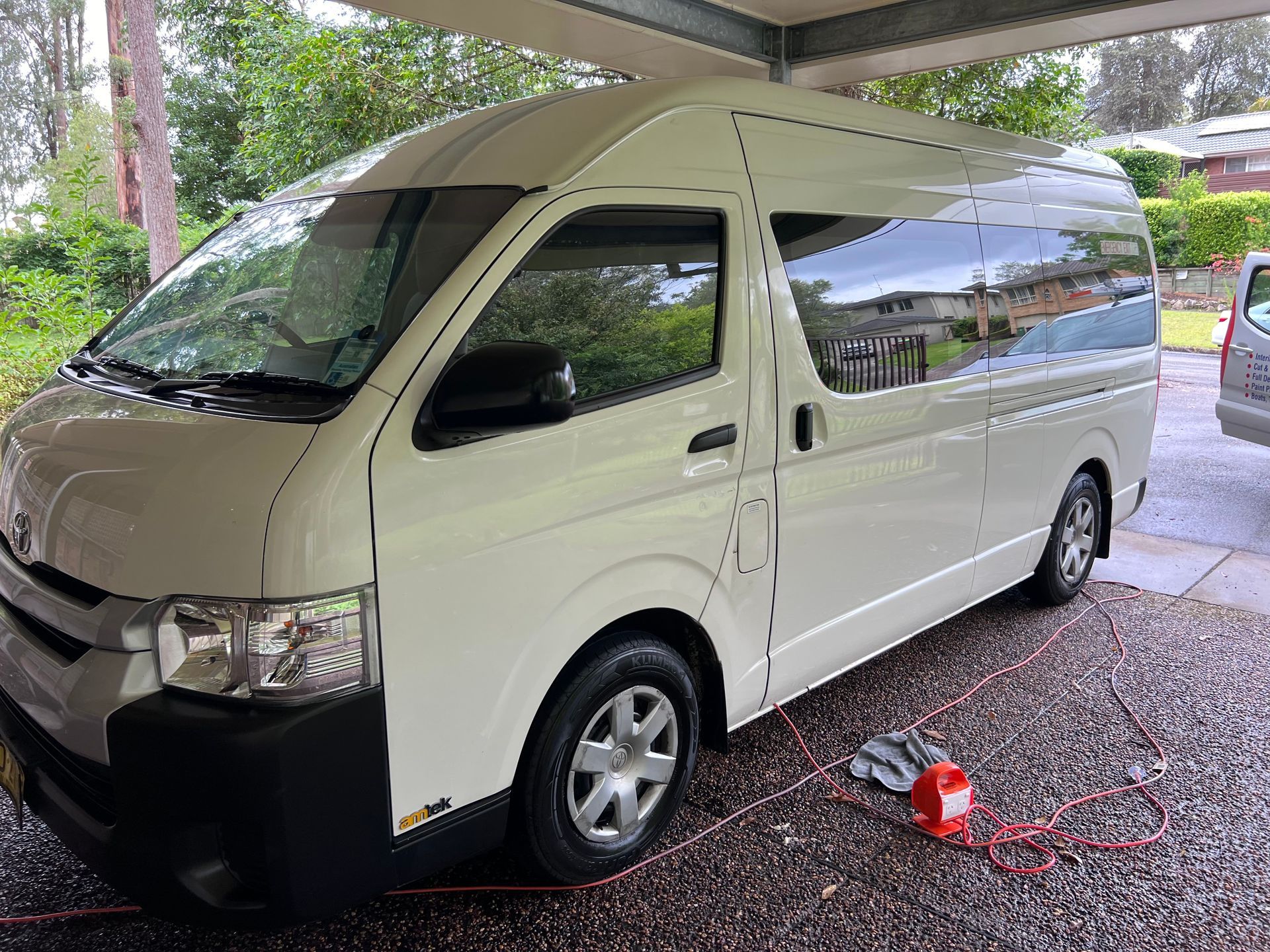 White Camper Van Parked Under a Carport — Car Detailing Mobile Cleaning Co In Port Macquarie, NSW