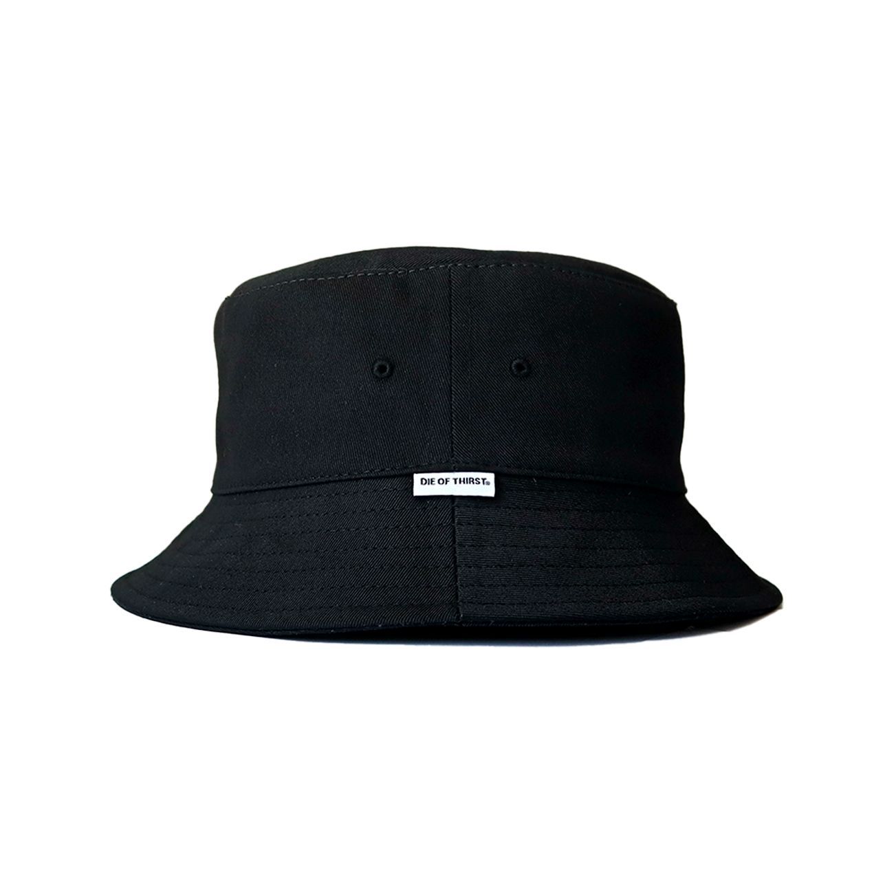 Black bucket hat with a small white tag on the brim.