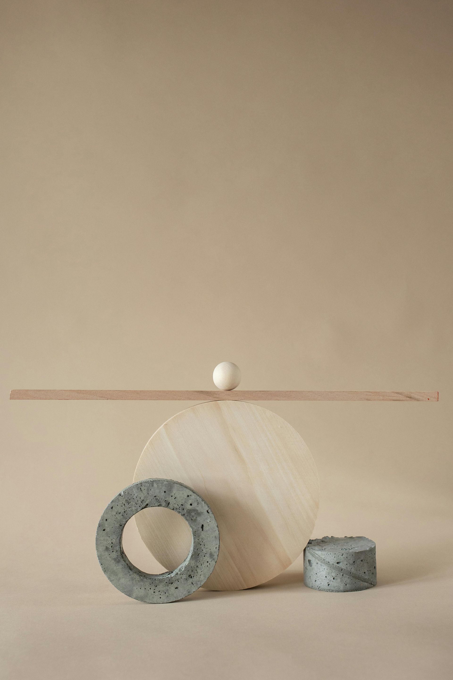 A circle and a cylinder are sitting on a table
