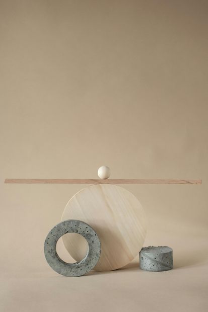 A circle and a cylinder are sitting on a table