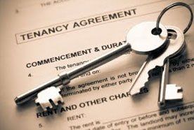 A set of house keys on a Tenancy Agreement